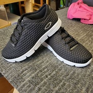 Oakley women's sneakers. Brand new sz 7 black